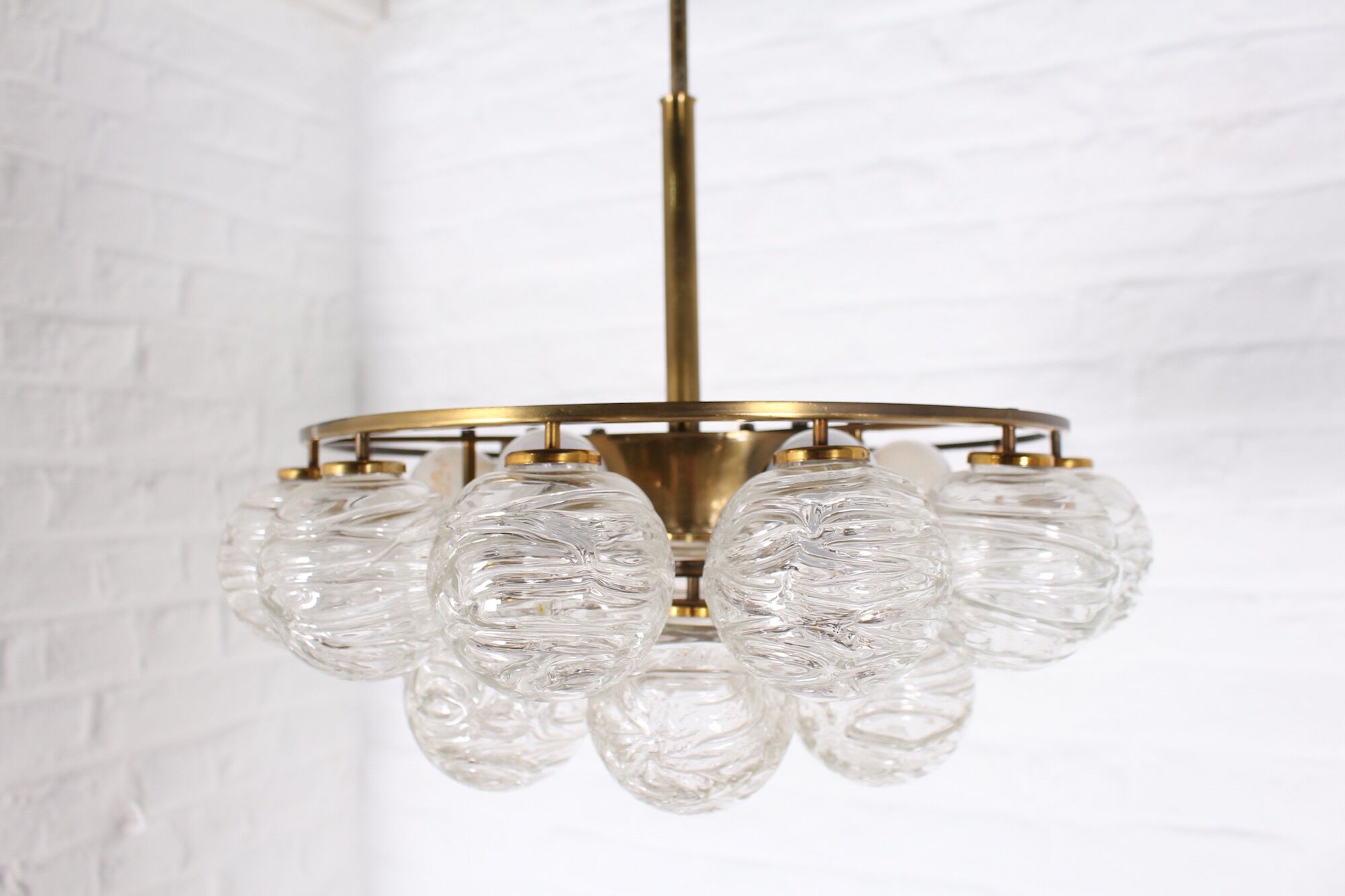 Brass chandelier and glass globes