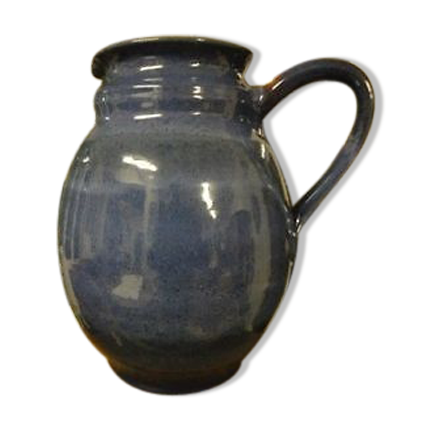 Blue ceramic pitcher signed