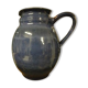 Blue ceramic pitcher signed