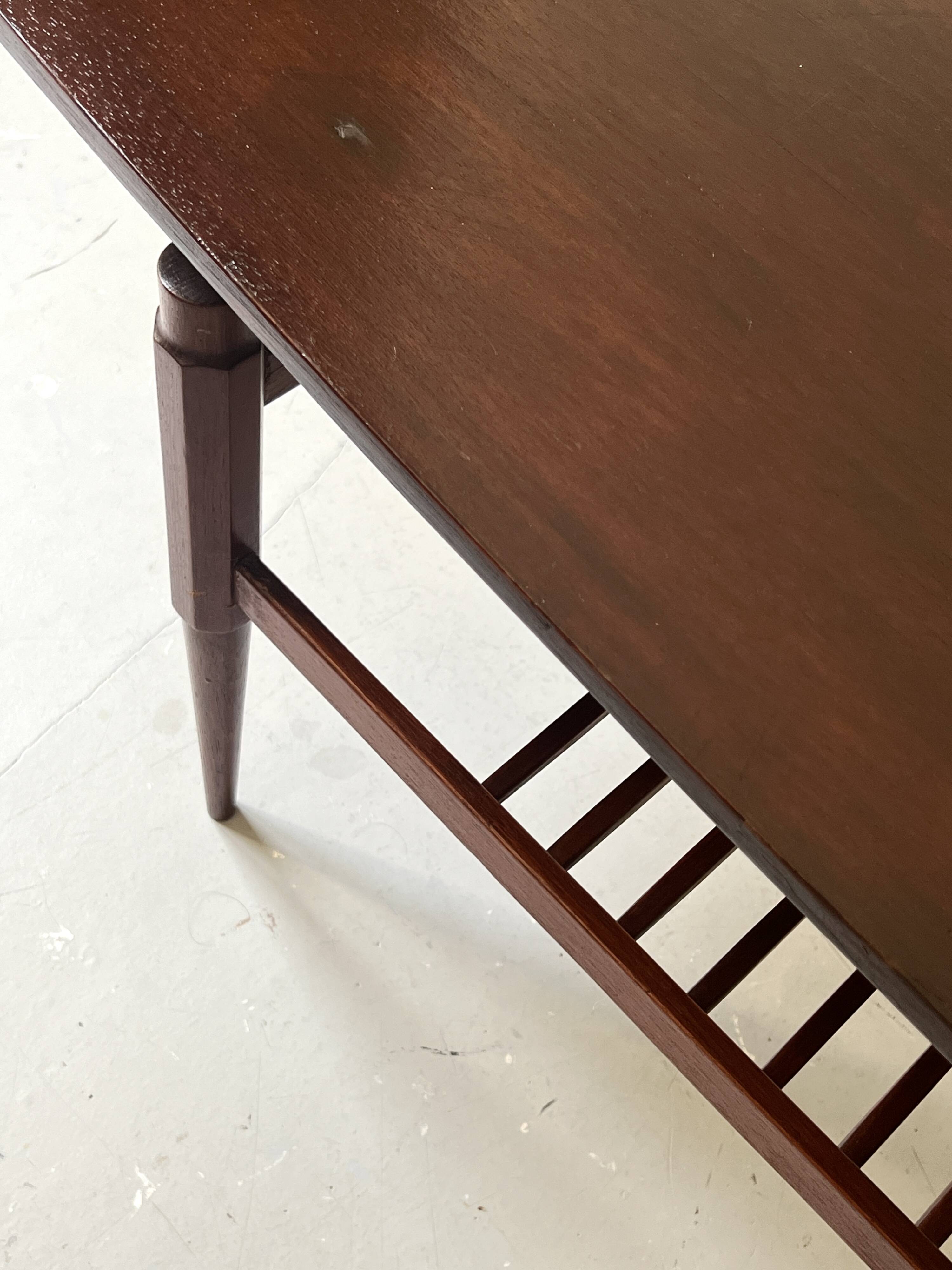 Danish teak coffee table with a double top, 1950s design.