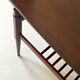 Danish teak coffee table with a double top, 1950s design.