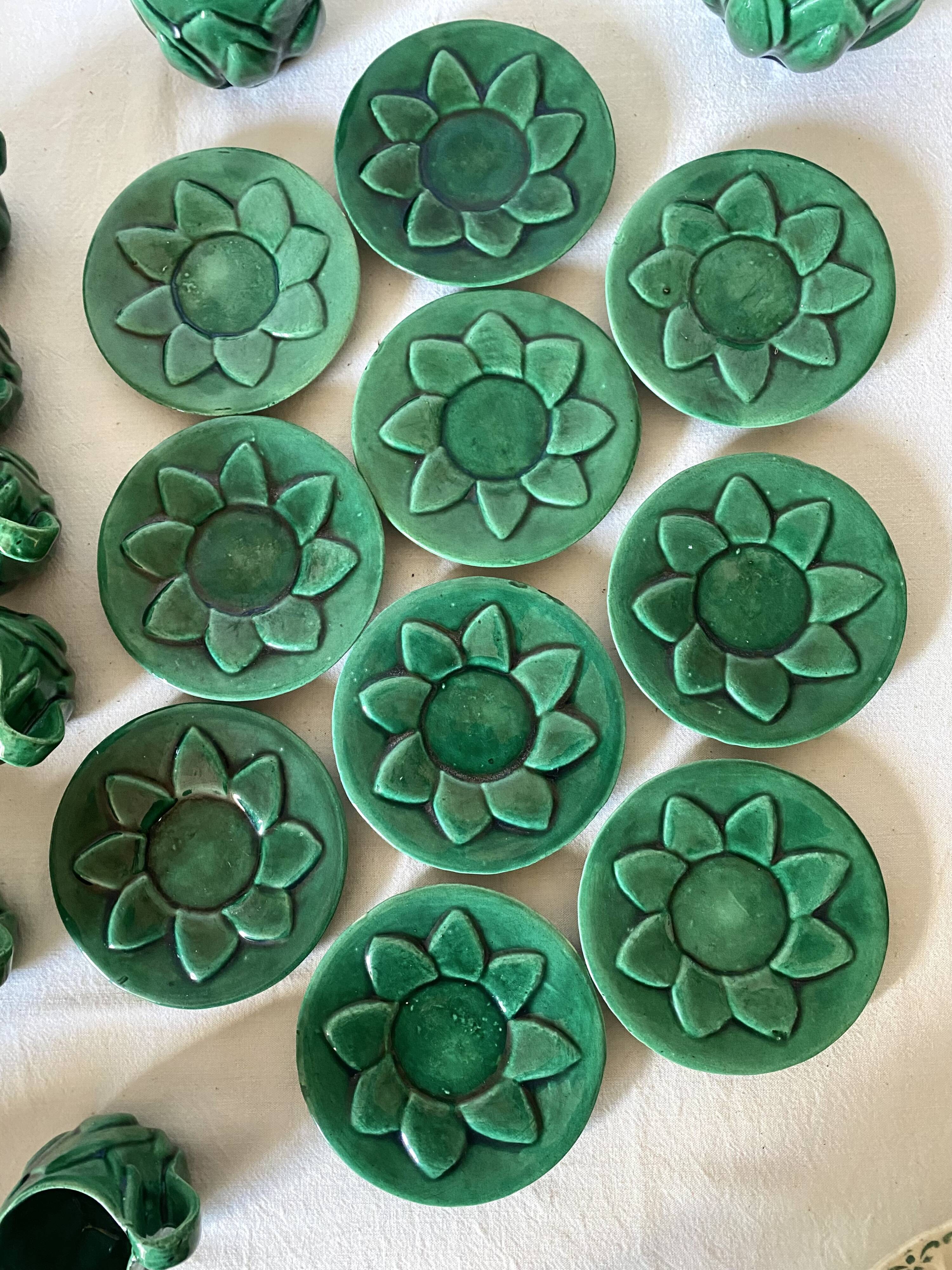 Antique slip cups with saucers, sugar bowl and milk pitcher