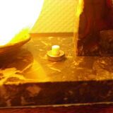 Table lamp with pendulum