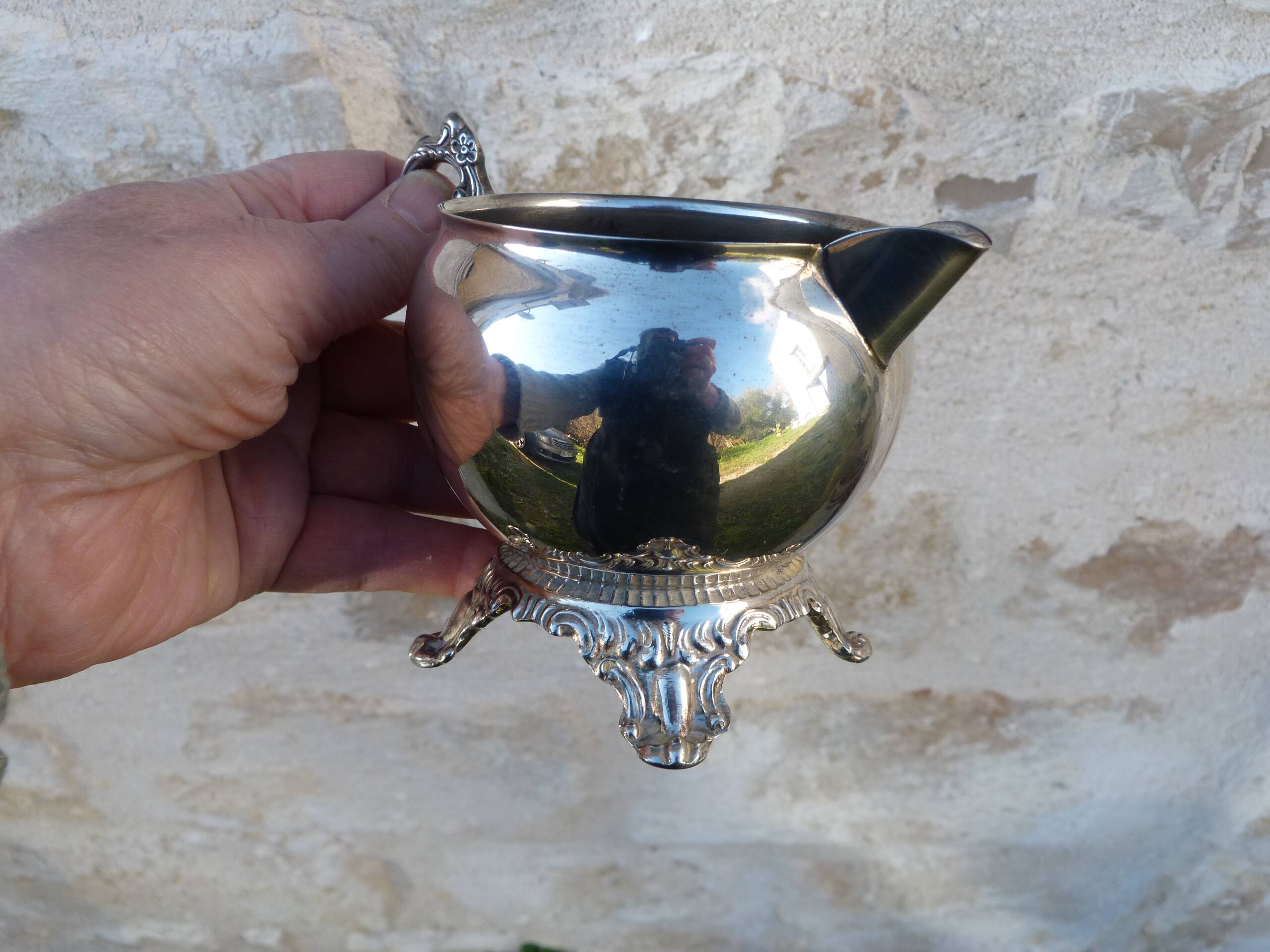 Old silver-plated metal milk or cream jug