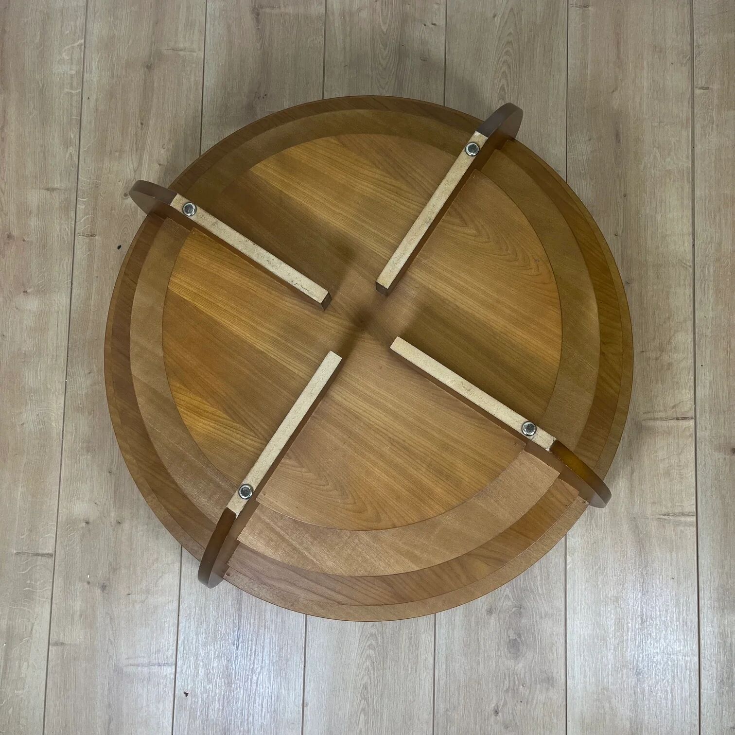 Sculptural coffee table with concentric rings, glass and wood, circa 1985.