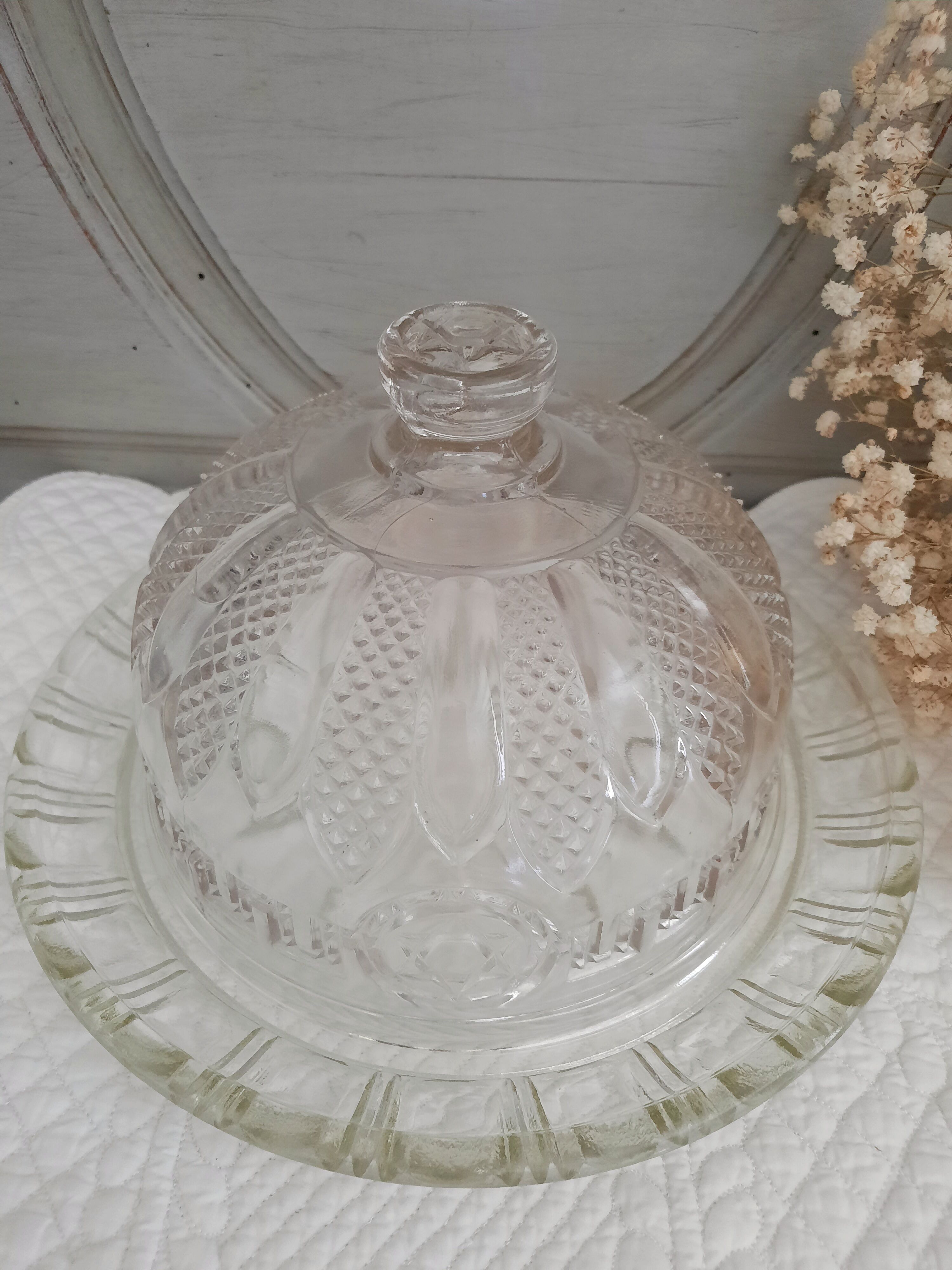 Chiseled glass bell on its dish