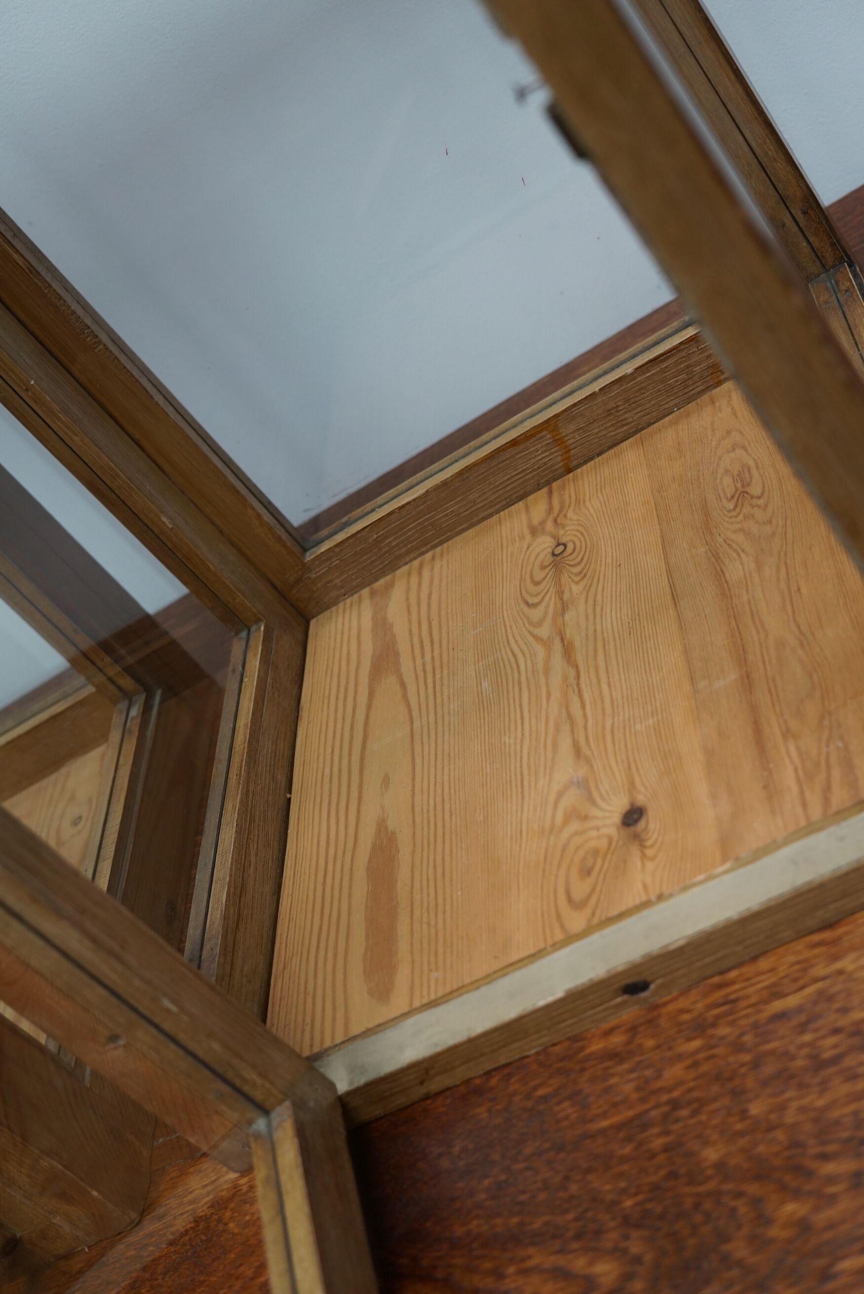 pair of faux oak shop display cabinets, circa 1920s