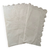 White cotton pillowcase with embroidery and monogram.