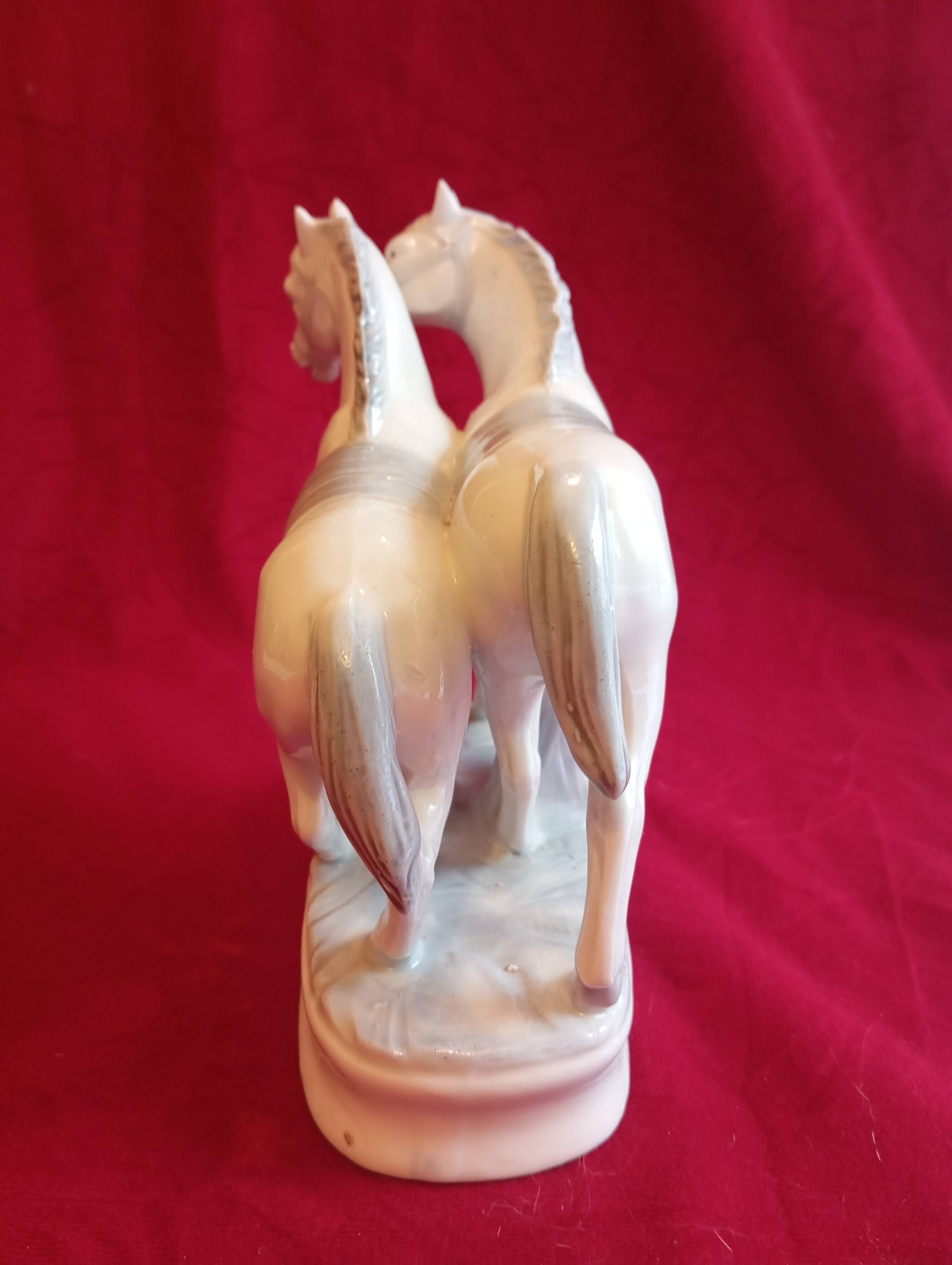 Subject: couple of ceramic horses