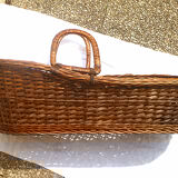 Old braided wicker couffin