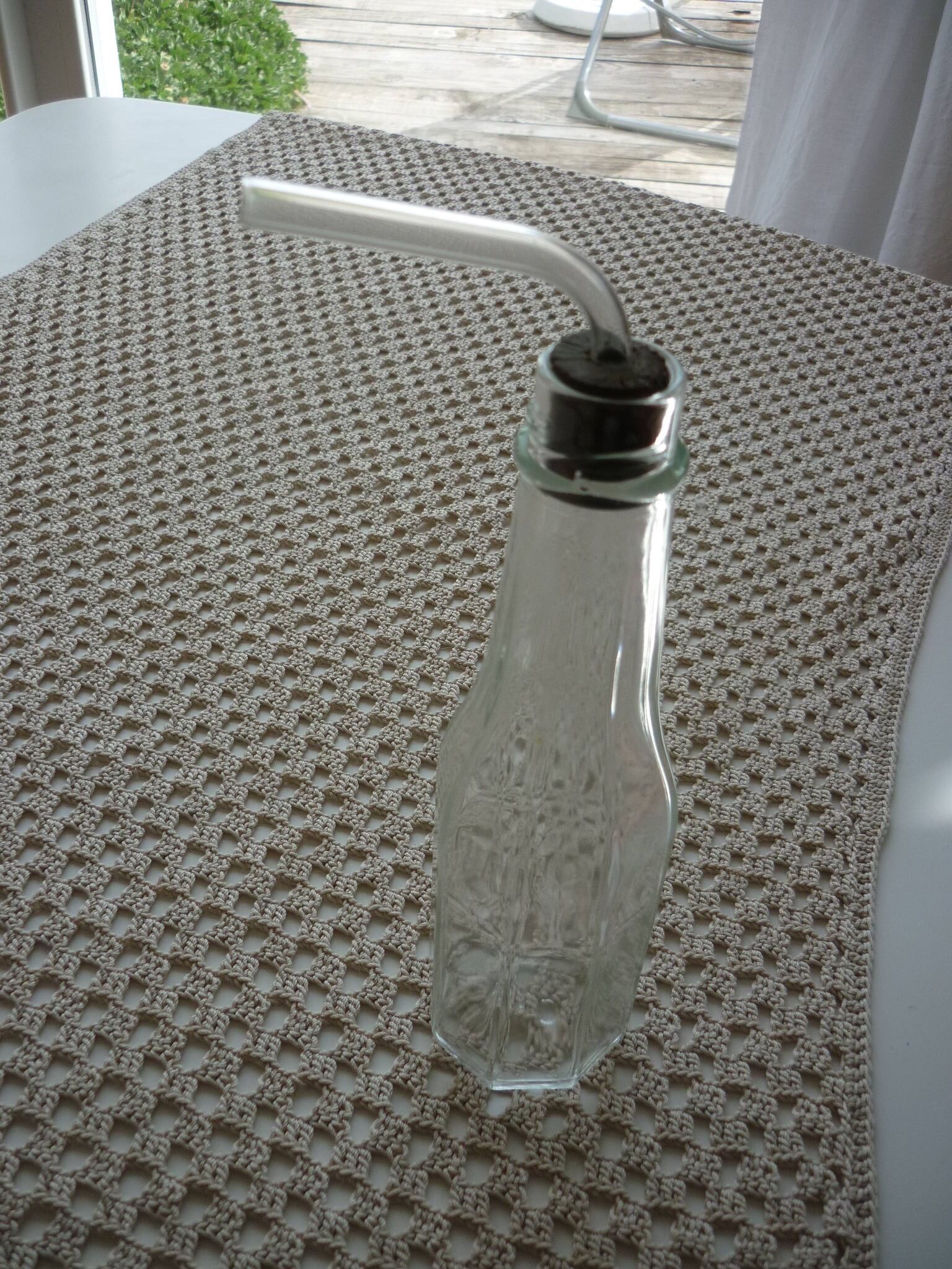 Old bottle with glass pipette