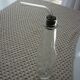 Old bottle with glass pipette