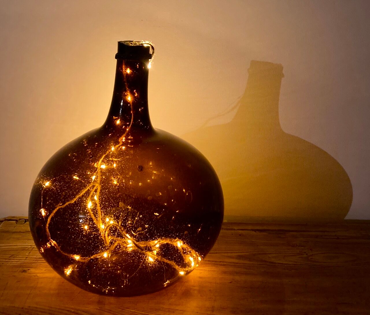 Old amber demijohn