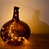 Old amber demijohn