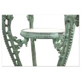 Patinated cast iron harness with marble tops