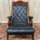 Fauteuil de bateau Chesteefield en acajou et cuir