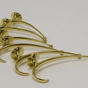Two curved wall coat racks in brass by Franz Hagenauer, Vienna, mid-20th century, 1950s.