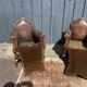 Pair of club armchairs in wood and leather, early 20th century.