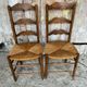Pair of Rustic Antique Turned Wood Chairs + Woven Straw Seat Wine