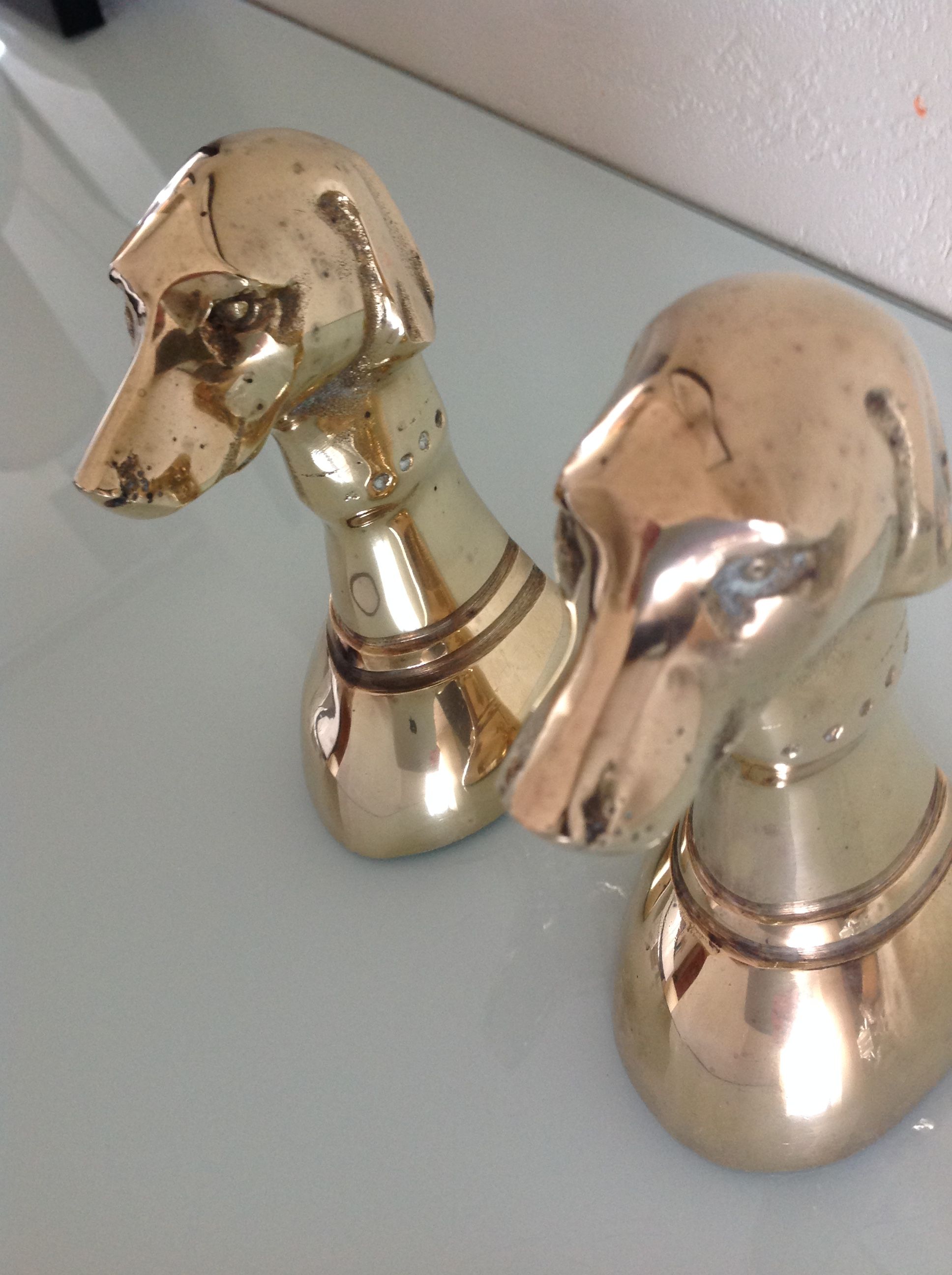 Pair of greenhouse books Greyhound brass heads 60/70