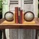 Pair of greenhouses vintage wooden books world map
