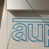 Illuminated vintage advertising sign