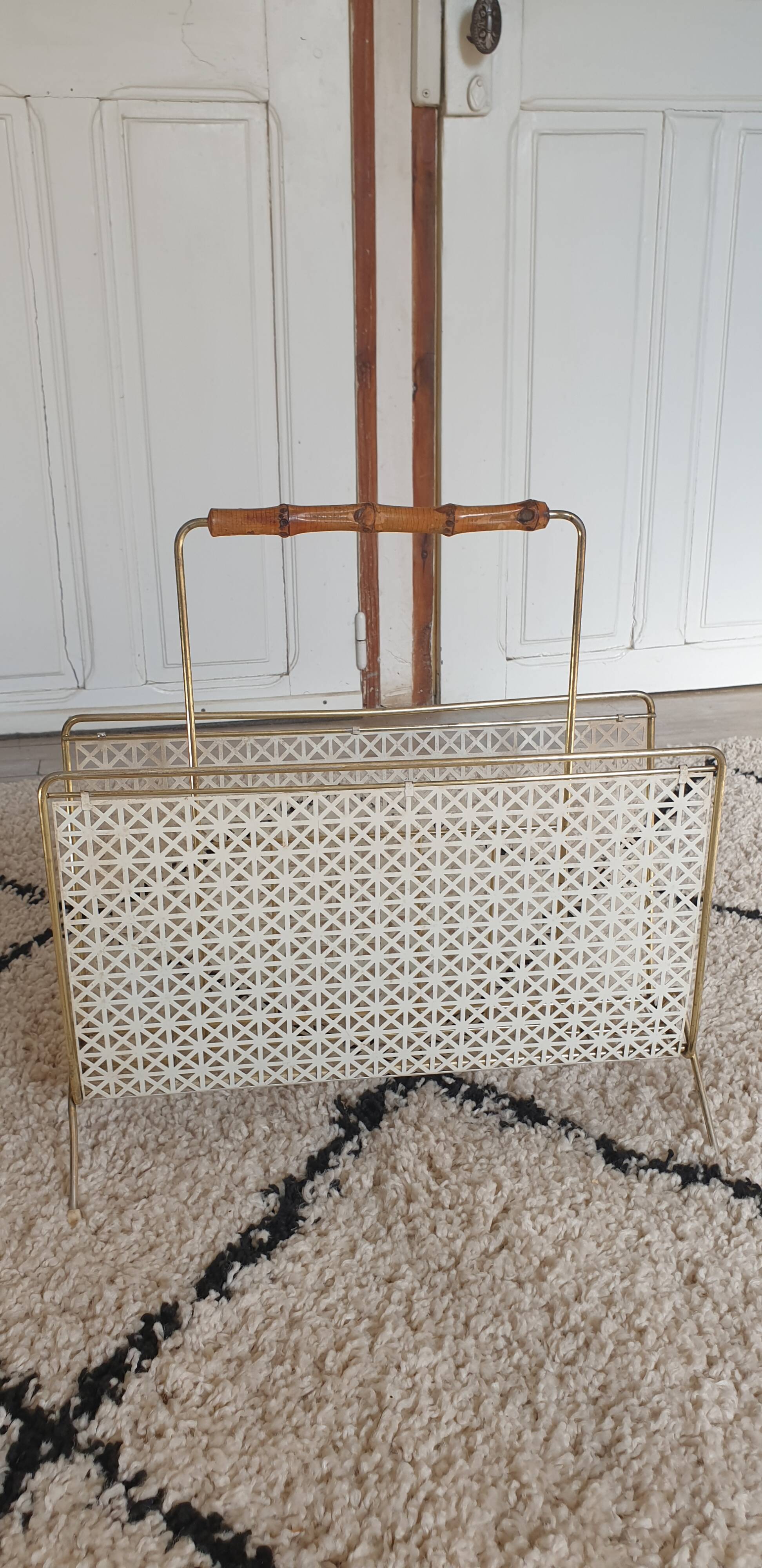 Perforated metal review door