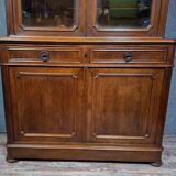 Buffet deux corps époque Napoléon III en bois massif.