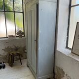 Blue patinated cap cabinet