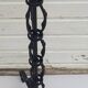 Black wrought iron floor lamp attributed to Gilbert Poillerat