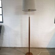 Mid-century floor lamp in teak and brass by Falkenbergs Belysning, Sweden, 1960s.