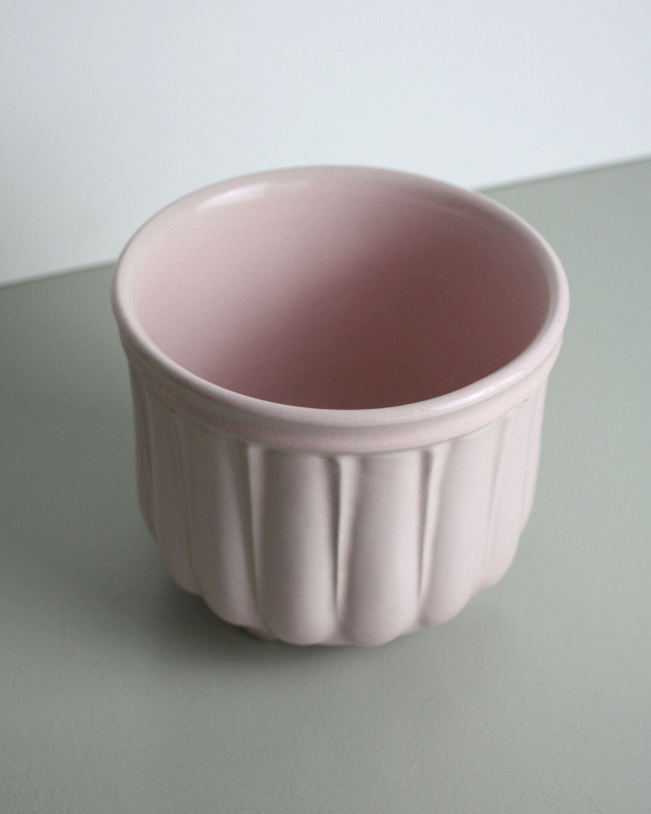 Pink glazed ceramic pot cover