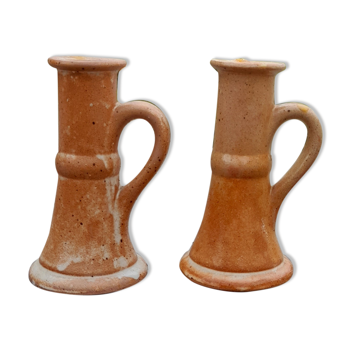 Duo of candlesticks in hand-crafted sandstone, raw and clean, mid-20th