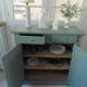 Vintage Parisian sideboard with 2 doors and 2 drawers, re-enchanted in smoky green.