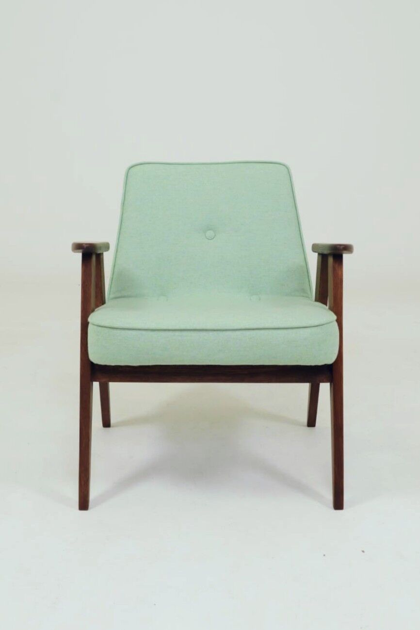 Pastel pistachio wool fabric Scandinavian armchair, oak wood.