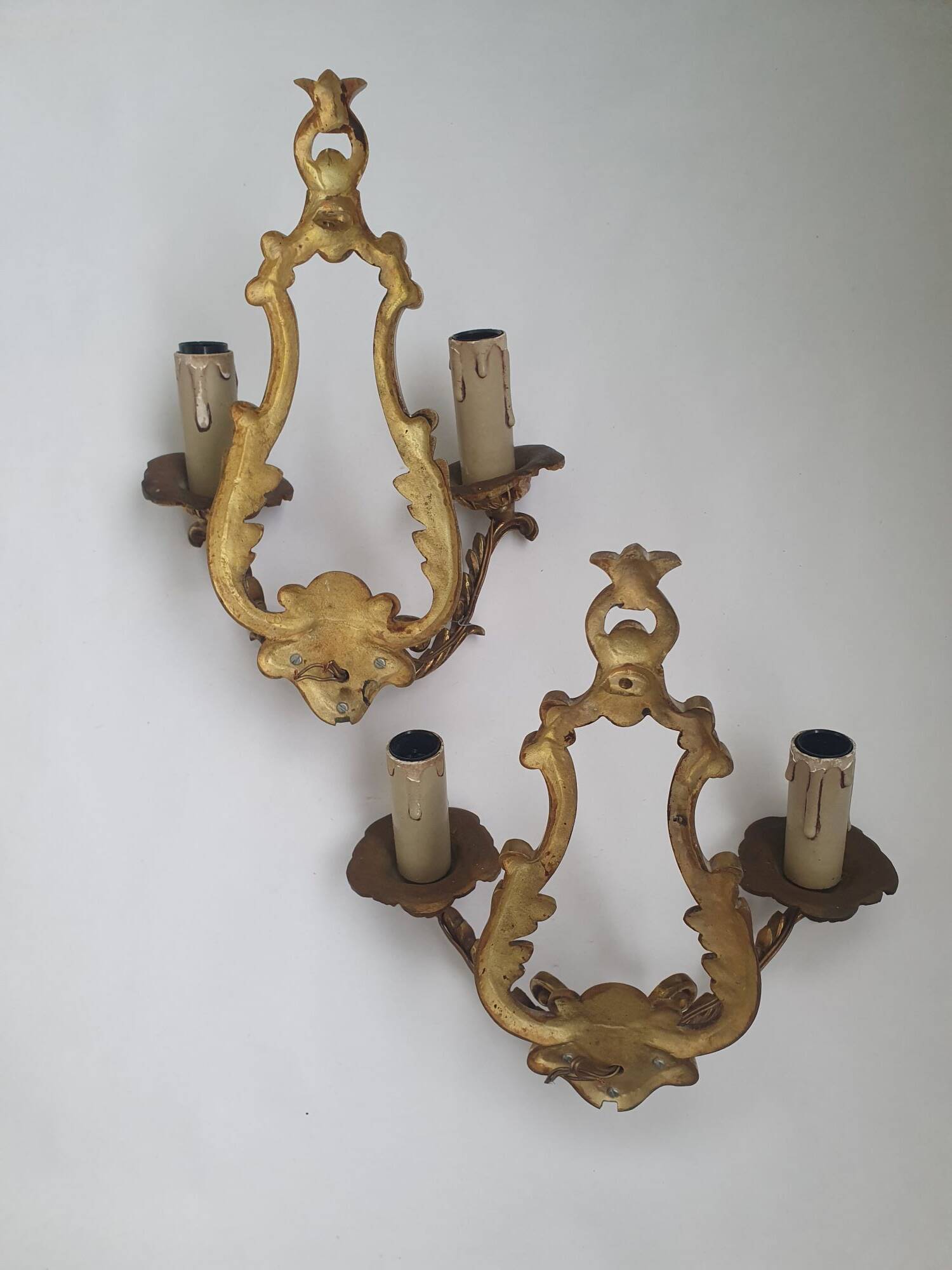 Pair of antique candlestick wall sconces