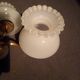 brass and white opaline wall lights