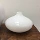 Duo of soliflore vases in white blown glass