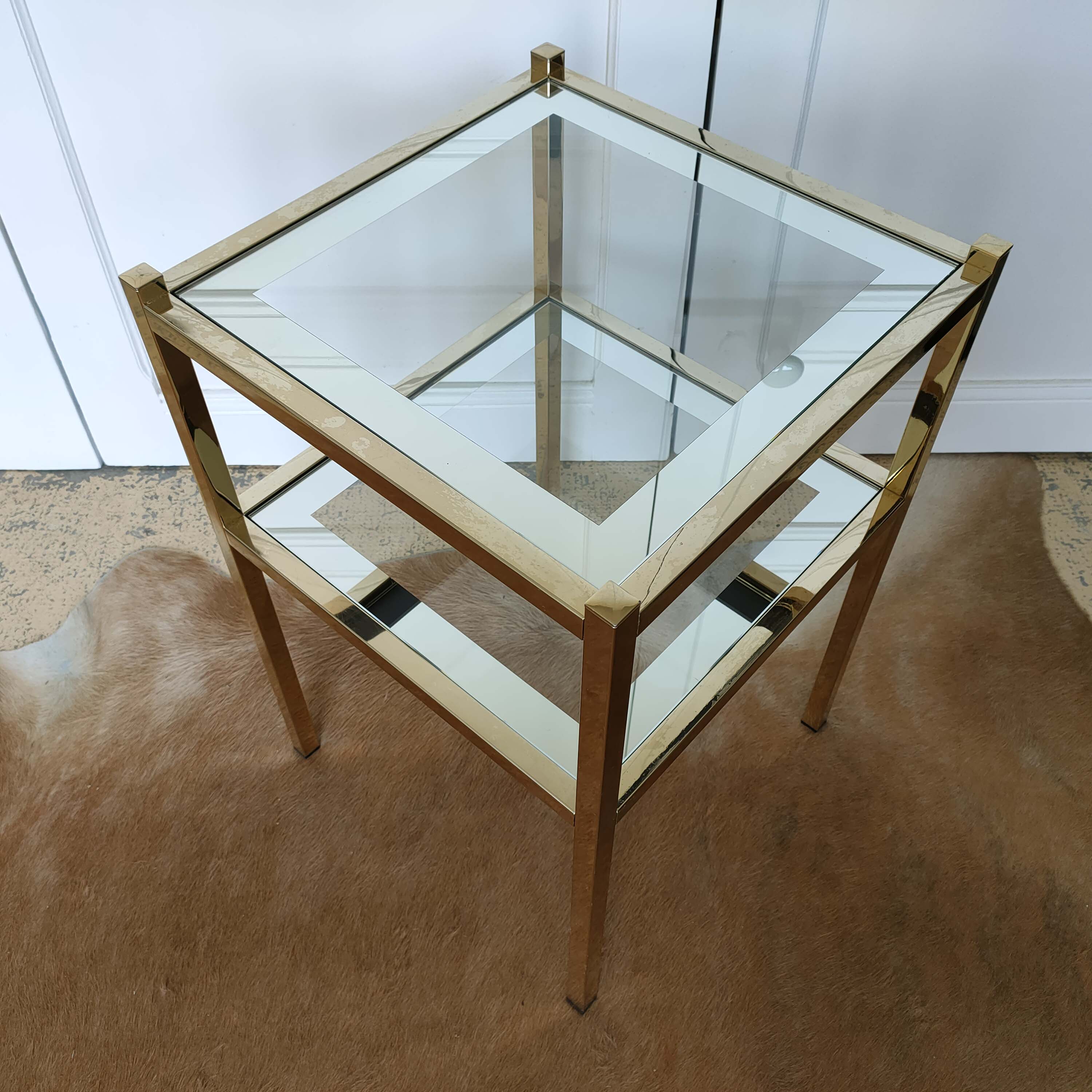 Golden sofa tip and mirror glass