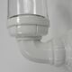 Wall lamp in porcelain with a transparent glass shade, 1930s.