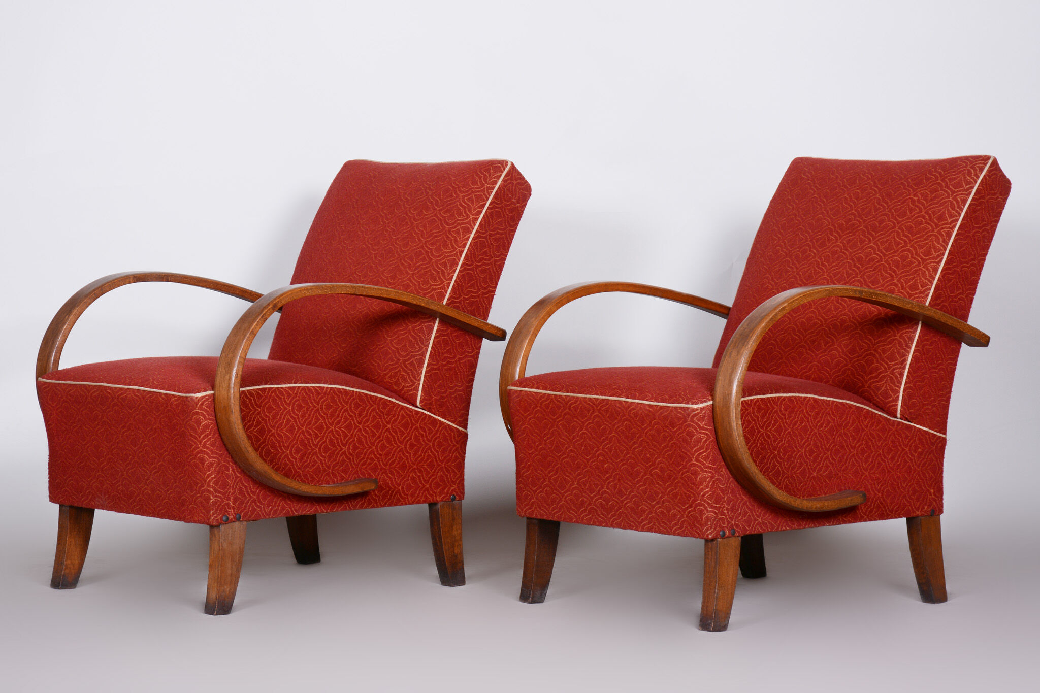 Pair of red Art Deco armchairs made in the 1930