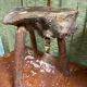 Old brutalist design wooden tripod stool