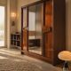 Modernist mahogany wardrobe with smoked mirrors (late 1970s)