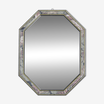 Old octagonal beveled mirror.