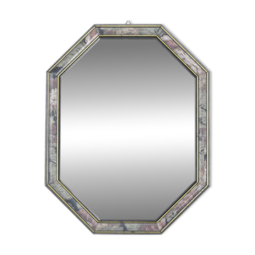 Old octagonal beveled mirror.