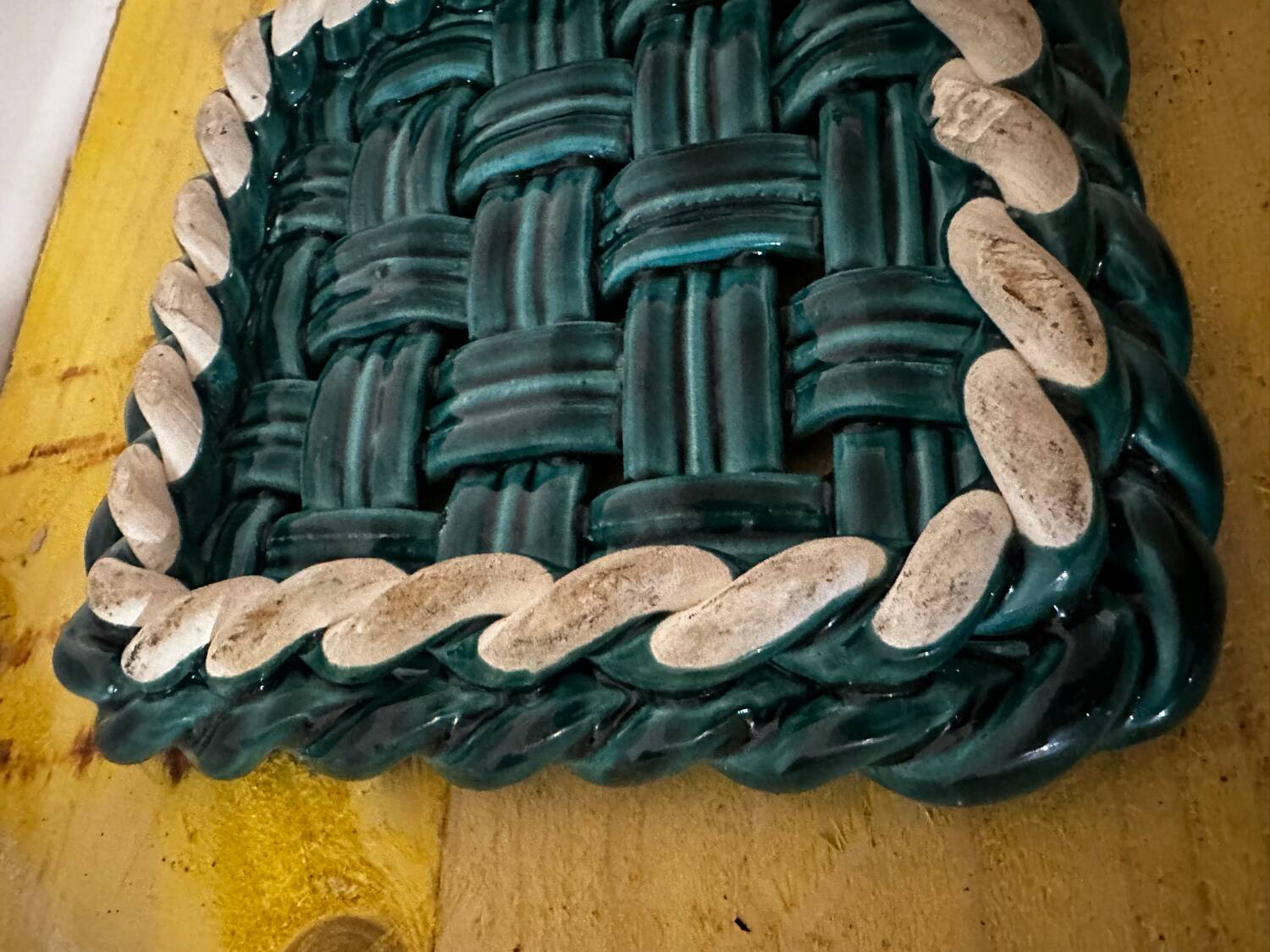 Woven ceramic trivet from Vallauris in the Massier style.