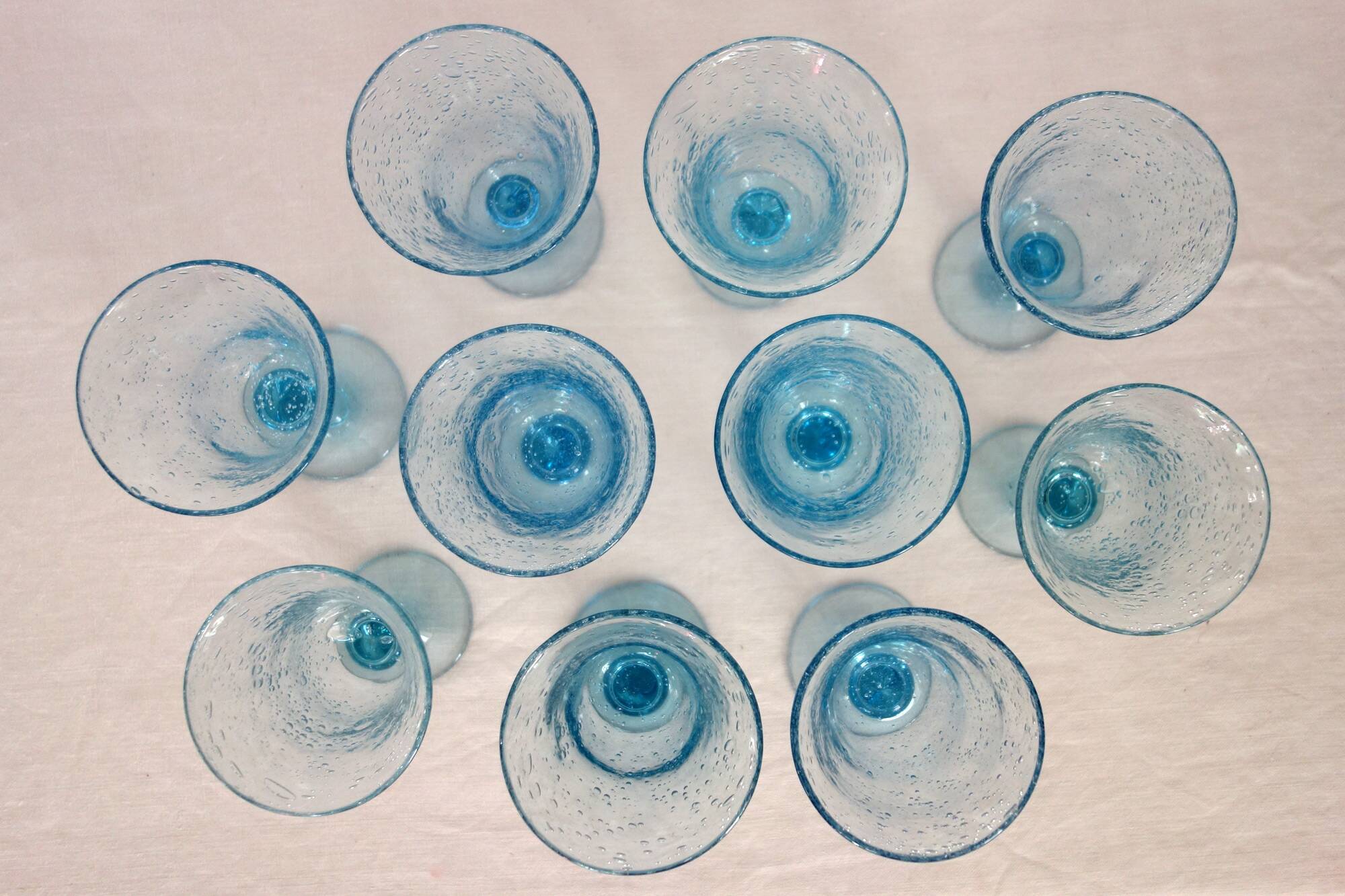 10 footed glasses from the biot glassworks in blown glass.