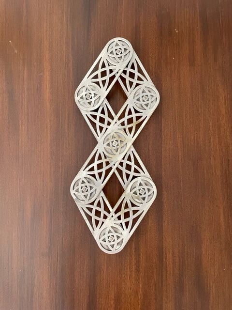 Art nouveau silver metal underside, retractable