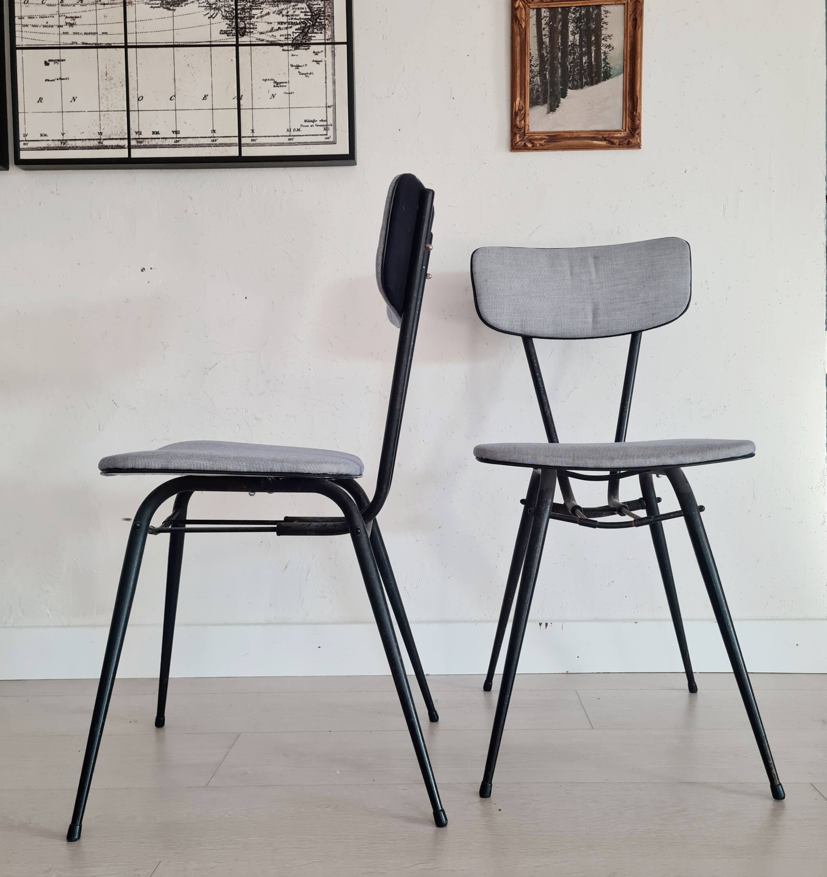 Pair of black metal and blue fabric chairs