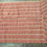 Handmade pure natural wool Berber rug in pink, size 150 x 250 cm.